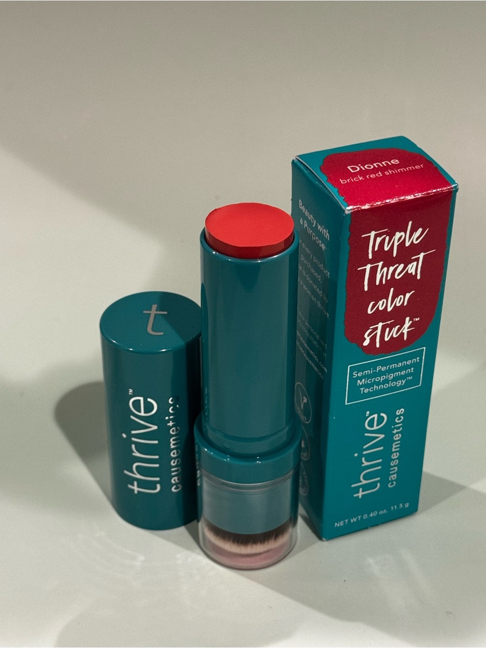 thrive causemetics Triple Threat Color Stuck - Dionne Brick Red Shimmer